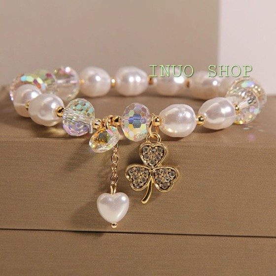 Pulsera de cristales con dijes